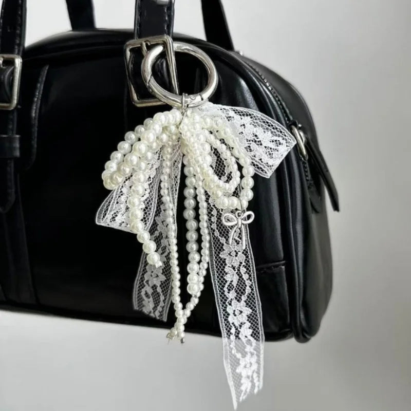 🎁 Imitation Pearls Lace Bowknot Keychain Sweet Beaded Pendant Keyring for Women Handbag and Backpack Key Chain Exquisite Ornament (100% off)