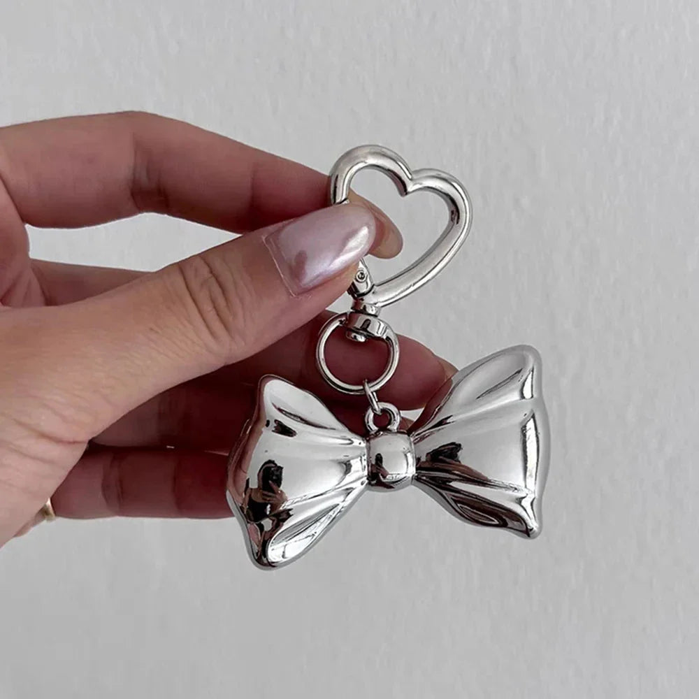 🎁 2025 Y2K Sweet Punk Big Bowknot Keychain for Women Girls Smooth Metal Heart Love Buckle Bow Pendant Bag Decoration Accessories (100% off)